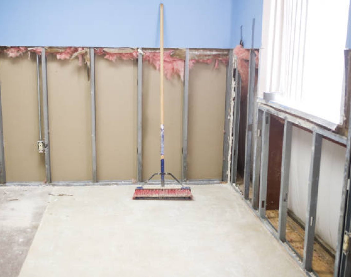 Office Demolition in Conshohocken, PA underway as a crew removes interior framing from a suite